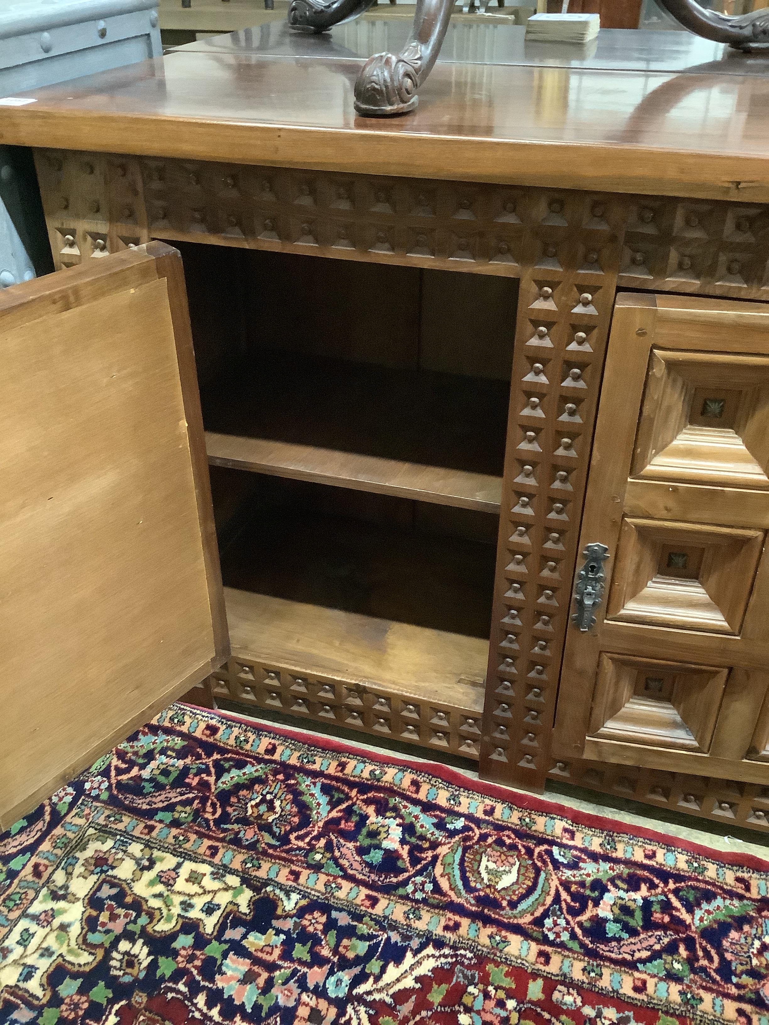 A Spanish walnut and fruitwood sideboard, width 171cm, depth 43cm, height 84cm